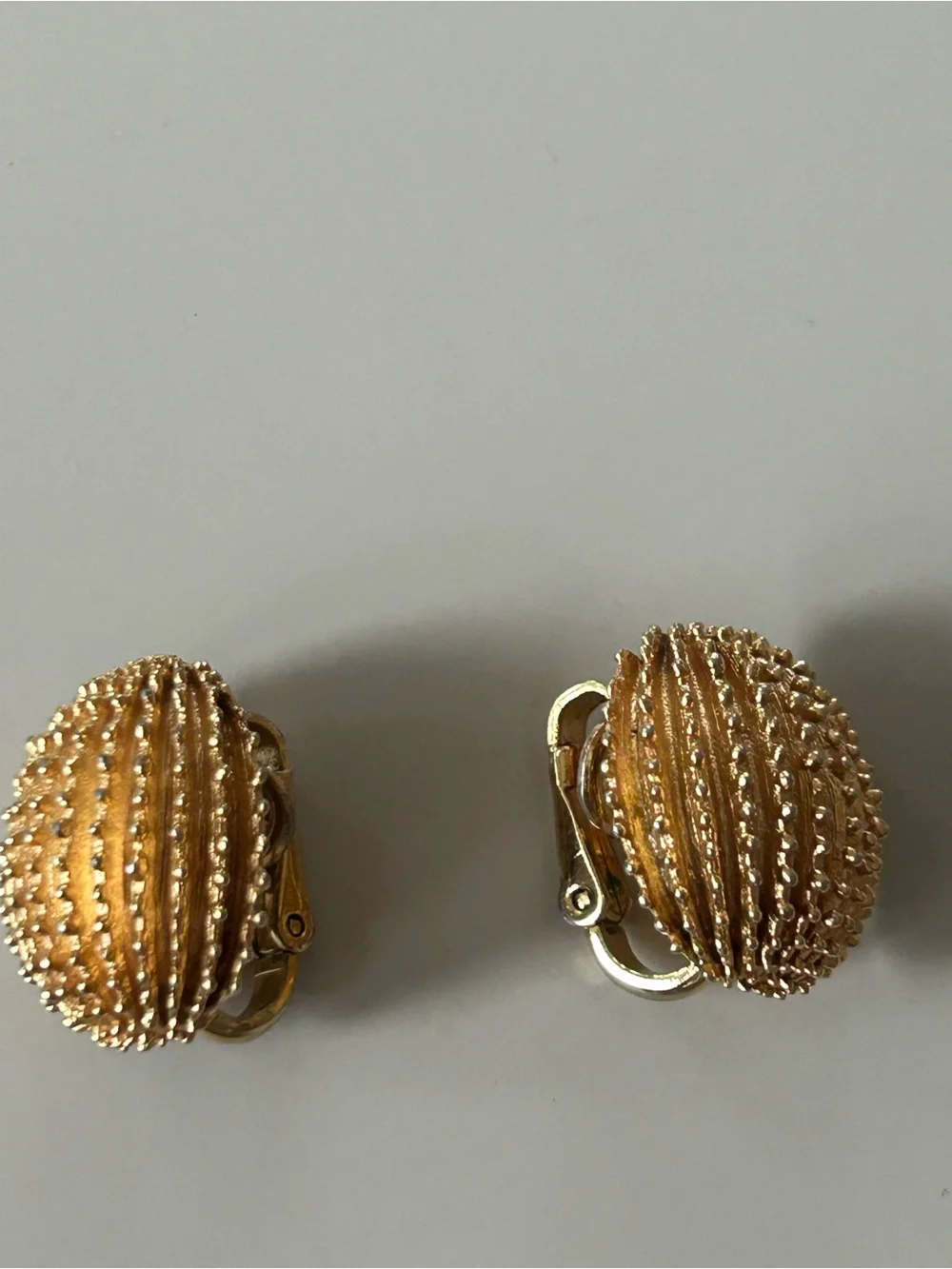 2 pairs of #CrownTrifari Clip-on Earrings. Gold-Tone Ribbed Domes and Florals.